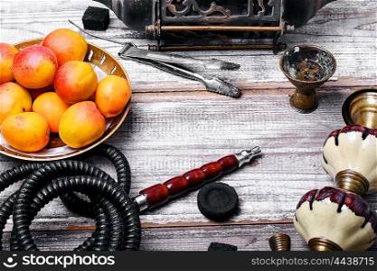 Shisha with fruity aroma. Details Eastern smoking hookah with fruit apricot
