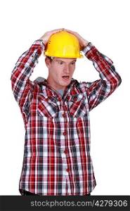 Shocked construction worker