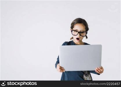 shocked girl looking laptop