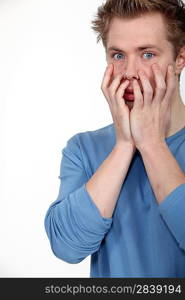 Shocked man on white background