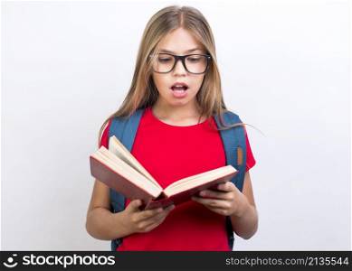 shocked schoolgirl with book