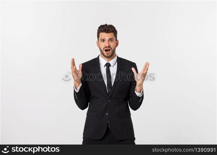 Shocked surprised businessman looking at camera with big eyes. isolated on white, looking at camera.. Shocked surprised businessman looking at camera with big eyes. isolated on white, looking at camera