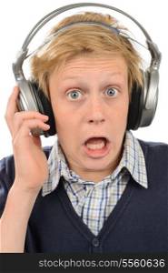 Shocked teenage boy wear headphones listening to music isolated on white
