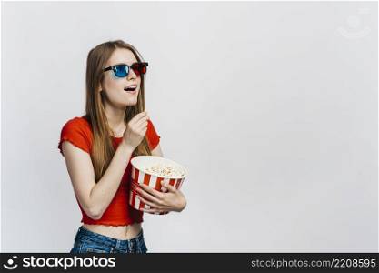 shocked woman wearing 3d glasses with copy space