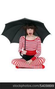 Shocked woman with umbrella