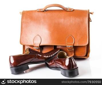 Shoes and bag on white background.