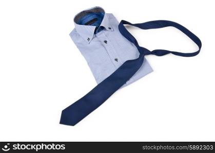Shoes and shirt with tie on white