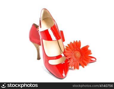 Shoes on a high heel and a bright flower