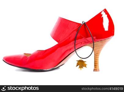 Shoes on a high heel and Pendant on neck