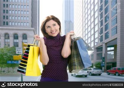 Shopper smiling woman shopping happy on the city