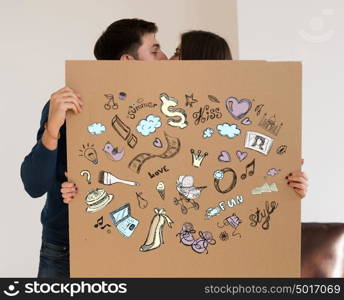 Shopping and credit concept. Young couple planning their future at new home