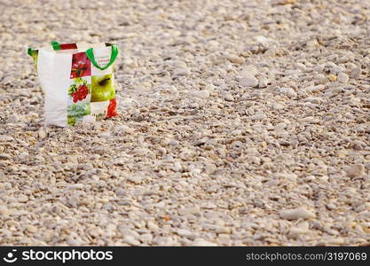 Shopping bag on the beach, Nice, Provence-Alpes-Cote D&acute;Azur, France