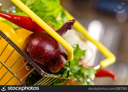 Shopping basket with many colorful vegetables. Healthy eating lifestyle, nutrients vegetarian food.. Shopping backet with dieting vegetables