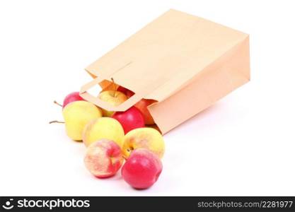 Shopping brown recycle gift bags and red apple isolated on white background