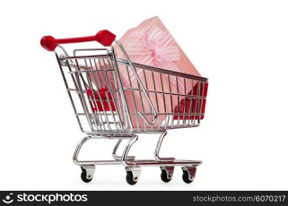 Shopping cart and giftboxes on white