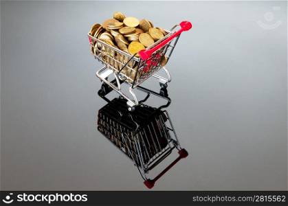 Shopping cart and gold coins