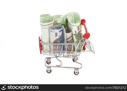 shopping cart full of euro banknotes isolated