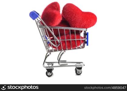 Shopping cart full of hearts for Valentine's Day on white background