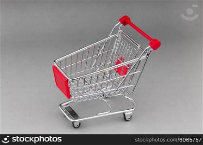 Shopping cart on seamless background