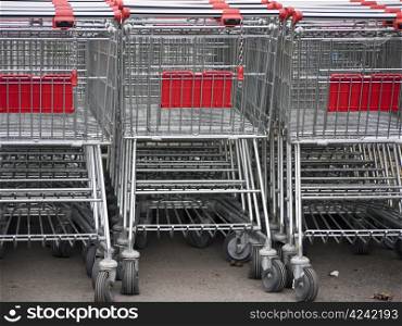 Shopping-Cart-Row. shopping carts in fromt of a supermarket