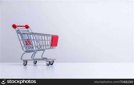 Shopping cart with copy space, grey, online shopping