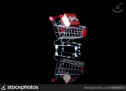 Shopping cart with gift - Valentines day e-commerce concept