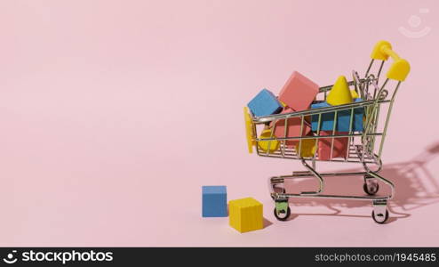 shopping cart with wooden elements. High resolution photo. shopping cart with wooden elements. High quality photo