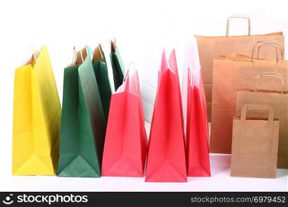 Shopping colorful gift bags isolated on white background