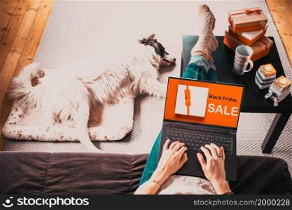 shopping online black Friday dog sleeping