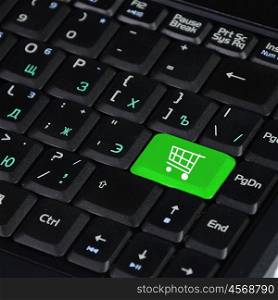 Shopping online. The button for purchases on the keyboard. Online shop.