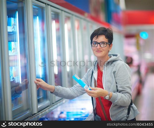 shopping woman in supermarket store buying food and grocery