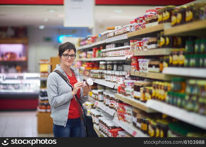 shopping woman in supermarket store buying food and grocery