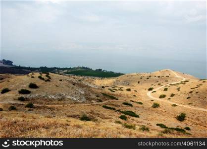 Shore of Lake Kinneret, the slopes of the Golan Heights in Israel. Slopes of the Golan Heights