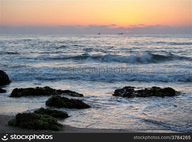 Shore of the Mediterranean Sea late in the evening after sunset
