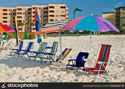 Shore with beach umbrella and chairs