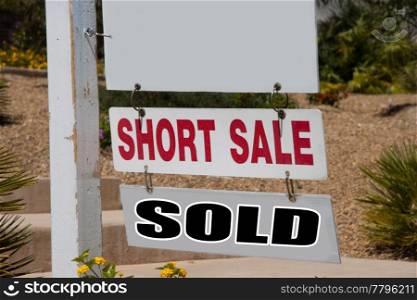 short sale and sold sign on pole with copy space