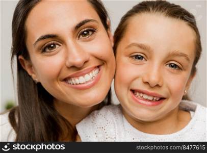 Shot of a beautiful Mother and Daughter smiling 