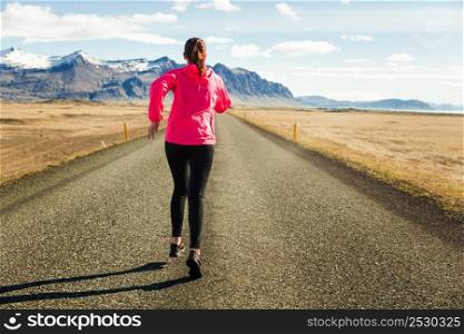 Shot of a beautiful woman running in a beautiful afternoon
