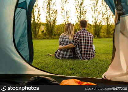 Shot of a happy couple c&ing on the nature