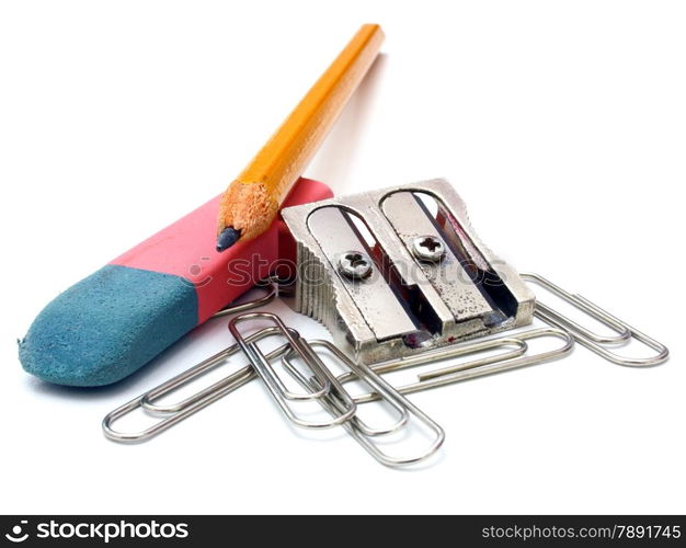 shot of eraser, pencil and pencil metal double sharpener on a white background