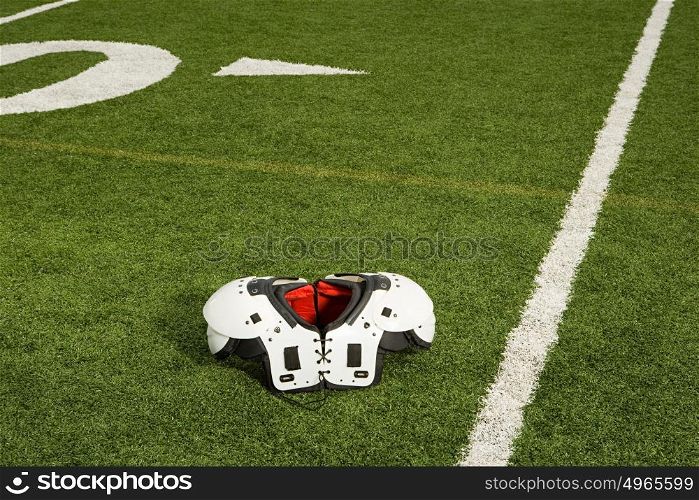 Shoulder pads on football field
