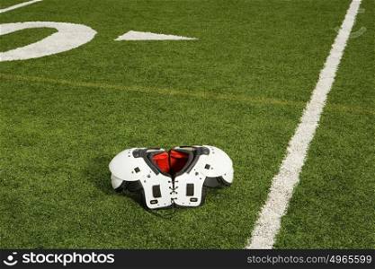 Shoulder pads on football field