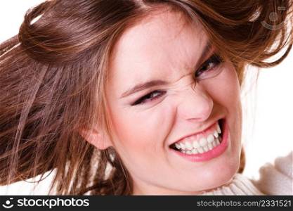 Shouting angry crazy girl with hair acting insane. . Crazy shouting angry girl.