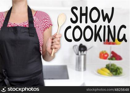 show cooking cook holding wooden spoon background concept. show cooking cook holding wooden spoon background concept.