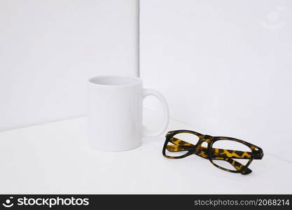 showcase concept with mug glasses