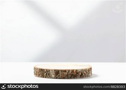 Showcase for cosmetic products. Product advertisement. Layout style design. Wood slice podium on white background with shadows. Natural cosmetics and beauty concept