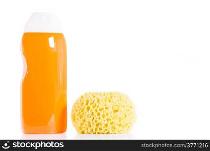 Shower gel and bath sponge on a white background