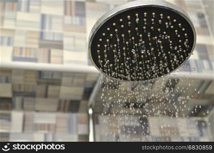 Shower head with dropping water. Saving water concept