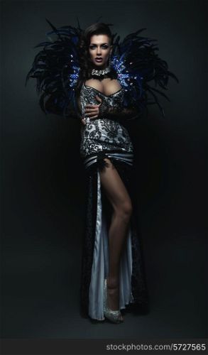 showgirl in dress with feathers