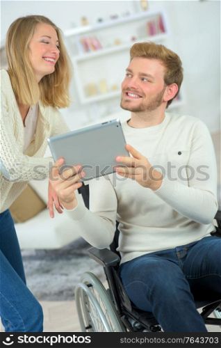 Showing girlfriend something on hos tablet